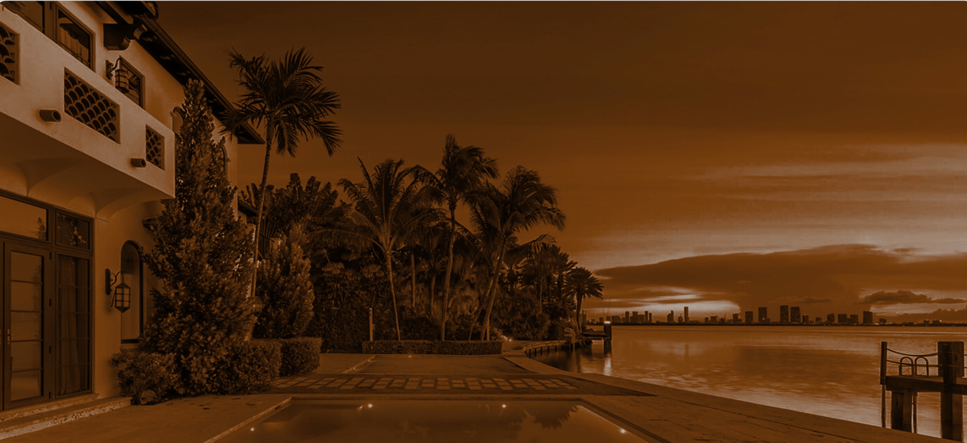 Luxury waterfront property at golden hour